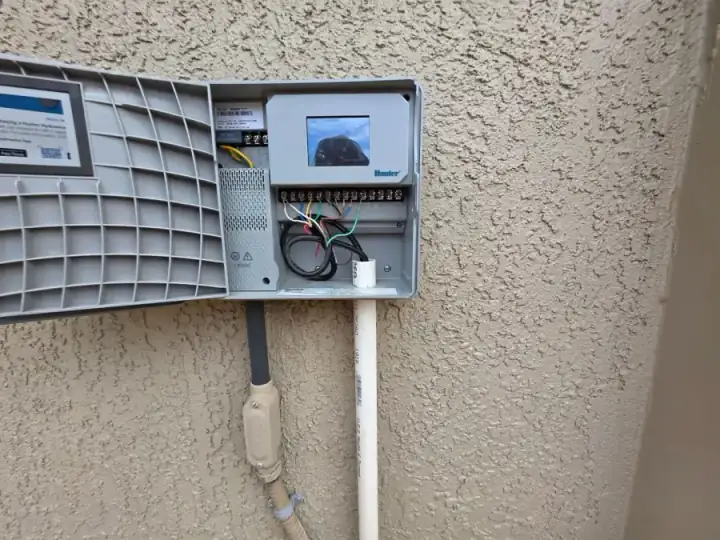 Hunter HPC-400 irrigation controller installed in an outdoor enclosure