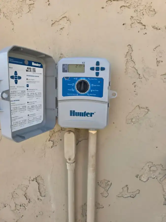 Hunter X2 sprinkler controller with four-zone dial and digital display